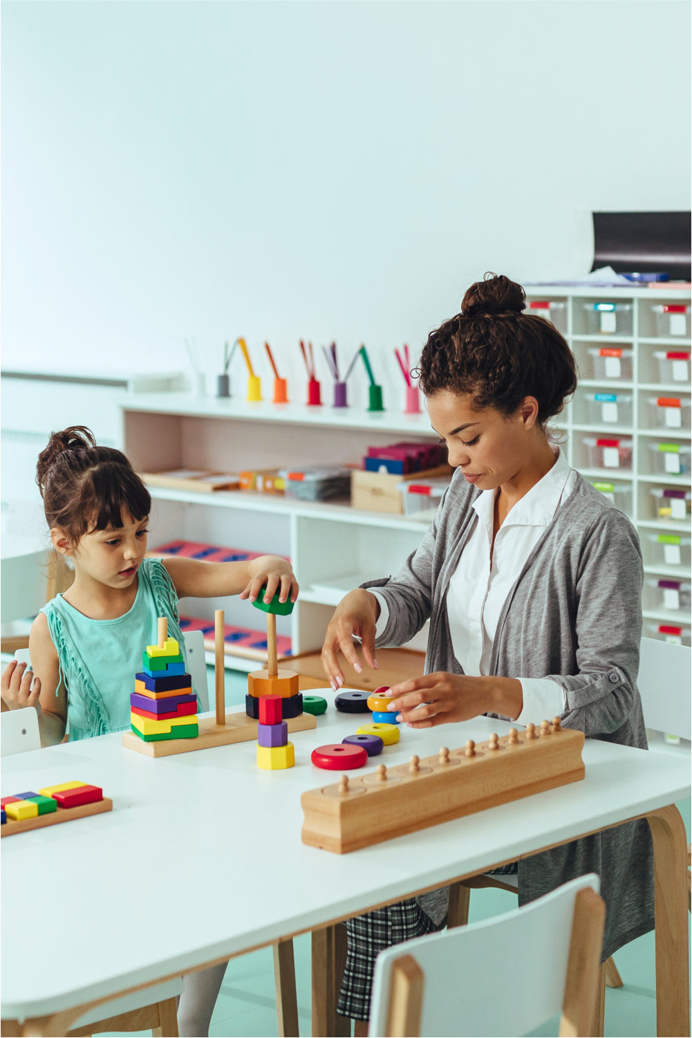 young girl with her teacher