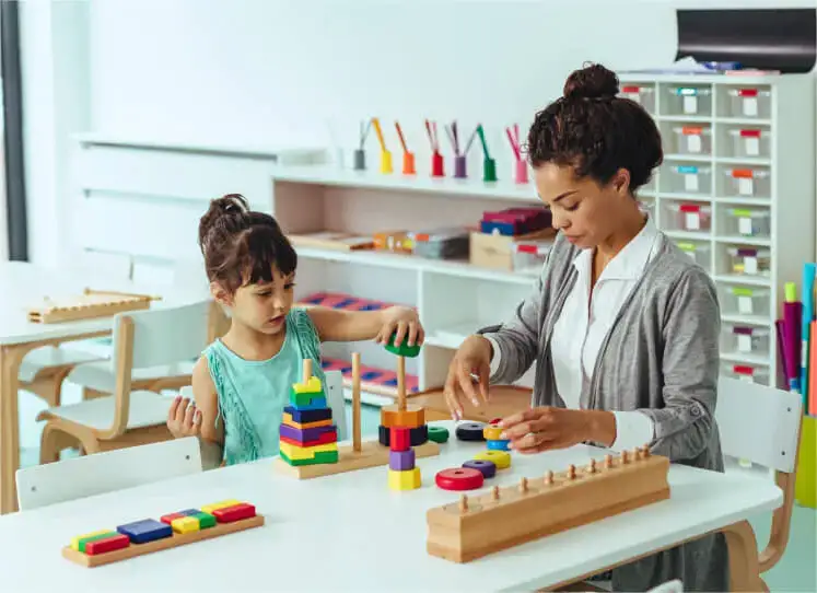 young girl with her teacher