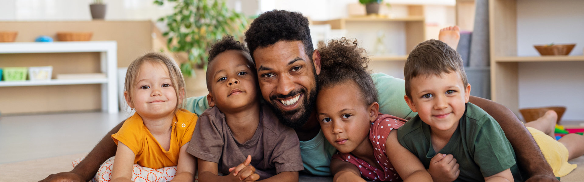 happy teacher with his students