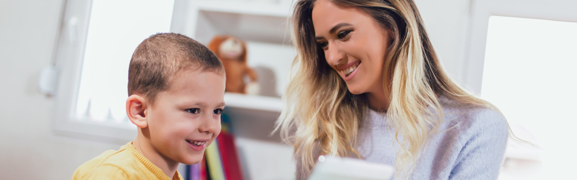 mother and child using tablet